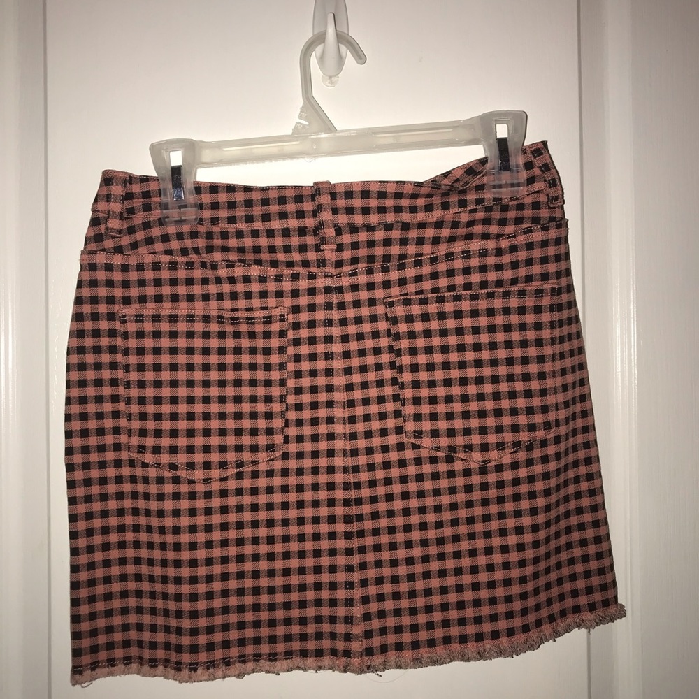 A black and pink skirt only worn once